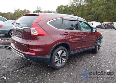 2016 Honda Cr-V Touring z USA, uszkodzony, nr VIN 5J6RM3H93GL001713